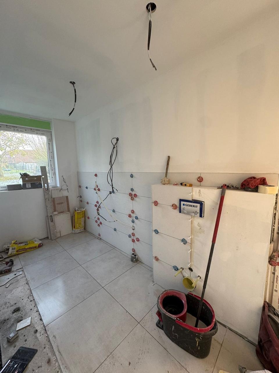 Carrelage mural et sol – coffrage WC suspendu